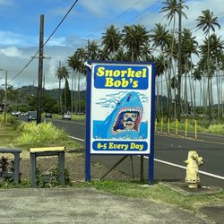 Snorkel Bob's Kapaa - Snorkel Bob sign, says 8-5 Every Day
