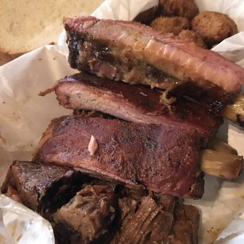 Slap's BBQ - Looks solid but trust me, that will fall off the bone with just your lips pulling them. Rib plate (3 ribs + 1 meat) $15.95 (those are burnt - Barbeque Near Me - Kansas City, Kansas Slap's BBQ - Looks solid but trust me, that will fall off the bone with just your lips pulling them. Rib plate (3 ribs + 1 meat) $15.95 (those are burnt - Barbeque Near Me - Kansas City, Kansas