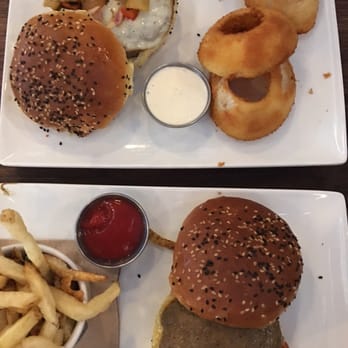 Eureka! - Bison and Bone Marrow Burger. Onion rings were breaded nicely and the onions weren't soggy inside. - American Near Me - Cupertino, California Eureka! - Bison and Bone Marrow Burger. Onion rings were breaded nicely and the onions weren't soggy inside. - American Near Me - Cupertino, California
