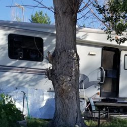 Emerald RV Park - Aluminum scraps around trailer that is torn up. Real trailer trash.