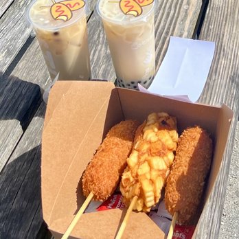 STIX - Combodog (Mozz/Hotdog) and Potatocombo Corndog. Green indicates combo dogs. Both drinks are Jasmine Milk Tea - Hot Dogs Near Me - San Francisco, California STIX - Combodog (Mozz/Hotdog) and Potatocombo Corndog. Green indicates combo dogs. Both drinks are Jasmine Milk Tea - Hot Dogs Near Me - San Francisco, California