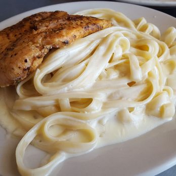 Paulie's - Small portion of Fettuccine Alfredo with salmon added on - Sandwiches Near Me - Houston, Texas
