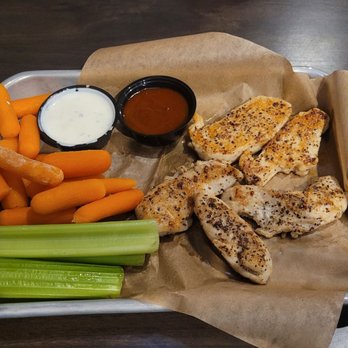 Buffalo Wild Wings - Naked chicken tenders - 5 pieces - Chicken Wings Near Me - Tucson, Arizona Buffalo Wild Wings - Naked chicken tenders - 5 pieces - Chicken Wings Near Me - Tucson, Arizona