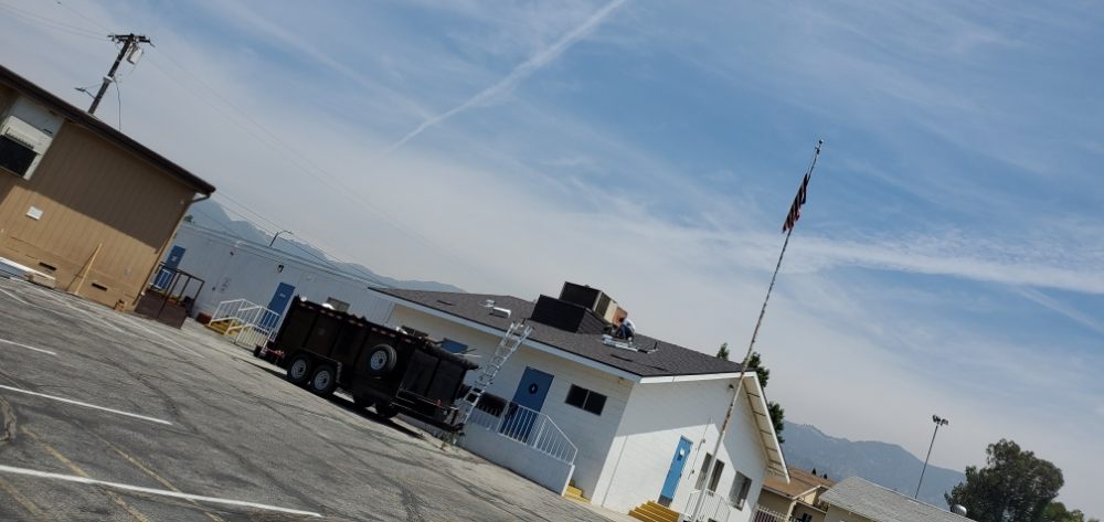 Slide of Alpha Roofing