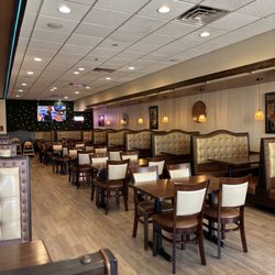 El Azteca Mexican Restaurant - Large dining space with large booths and tables. Seats are padded!