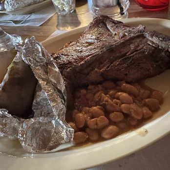 Daisy Mae's Steakhouse - T-bone and sides - Steakhouses Near Me - Tucson, Arizona