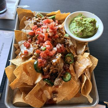 Station 101 Pub & Kitchen - Huge tray of pulled pork nachos & guacamole - Pubs Near Me - DuBois, Pennsylvania Station 101 Pub & Kitchen - Huge tray of pulled pork nachos & guacamole - Pubs Near Me - DuBois, Pennsylvania