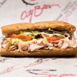 Grilled turkey breast, melted provolone, lettuce, tomatoes, mayo, salt & pepper.