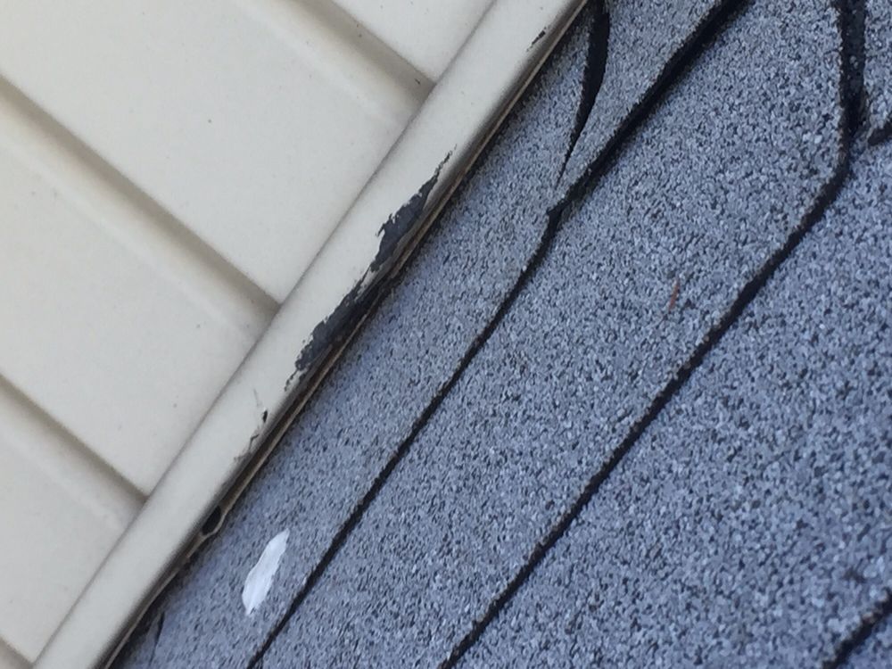 Slide of Alden Roofing