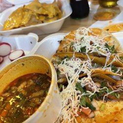 Tacos Al Carbon Restaurant - Birria Tacos and consomé to dip them in. Then drink the left overs like a soup!