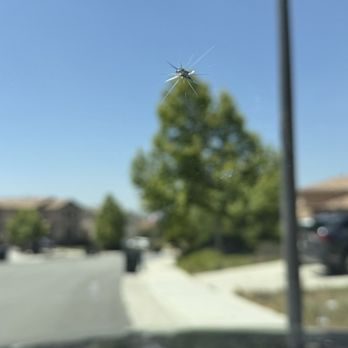 Auto Glass Now - They repaired this quarter-sized star/hybrid crack, reducing visibility of it by about 80-85%. - Auto Glass Services Near Me - Riverside, California
