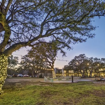 The Ruby Hotel & Bar - Lighting up the Lawn for outdoor seating, also available as event space. - Hotels Near Me - Round Rock, Texas The Ruby Hotel & Bar - Lighting up the Lawn for outdoor seating, also available as event space. - Hotels Near Me - Round Rock, Texas