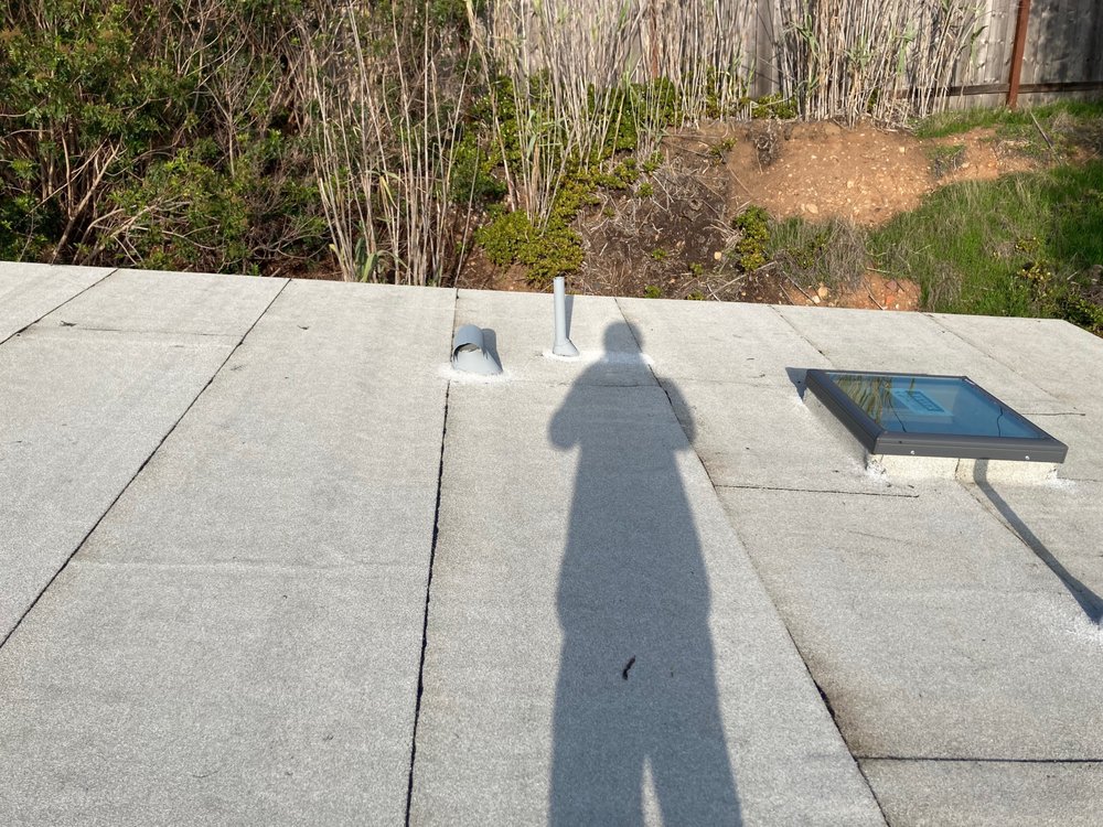 Slide of jauregui's roofing