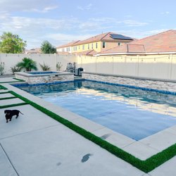 Roberts Construction - They did the tile, ledger stone, concrete and turf in this picture.