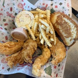 4 chicken fingers, toast and fries. 4 chicken fingers, toast and fries.
