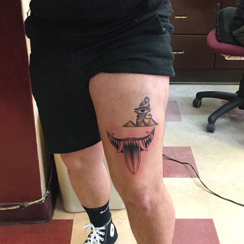 Classic Tattoo - The toothy mouth tat is Bryan Black - Tattoo Near Me - Fullerton, California