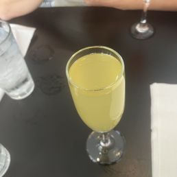 Peach and strawberry mimosas