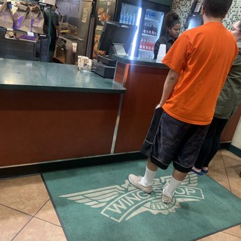 Wingstop - The only couple in line that had just walked in right before me. So wasn't too busy to pick up the phone. - Chicken Wings Near Me - Upland, California Wingstop - The only couple in line that had just walked in right before me. So wasn't too busy to pick up the phone. - Chicken Wings Near Me - Upland, California