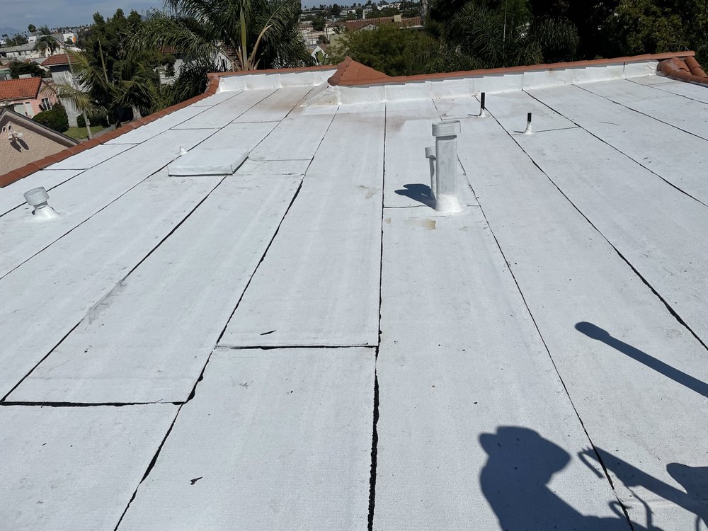 Slide of Galarzas Roofing