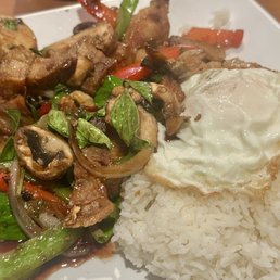 Ka Pao Moo Krob with Fried Egg (Crispy Pork Belly, bell peppers, onion, mushroom, basil, rice with fried egg)