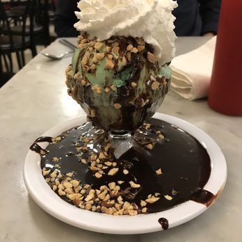 Fenton's Creamery - Small scoop of mint cookie! (One size smaller than a softball)   Topped with hot fudge, almonds, whipped cream and a cherry - Ice Cream & Frozen Yogurt Near Me - Vacaville, California