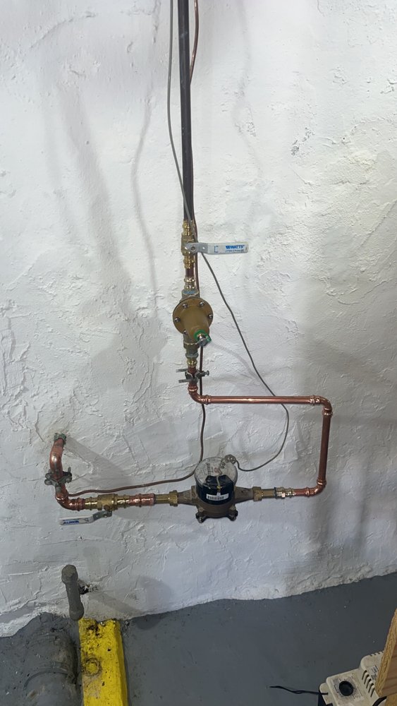 Slide of Mungavins Plumbing