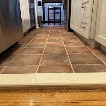 Stitch Coterie - Kitchen floor - bit of the hardwood floor as well - General Contractors Near Me
