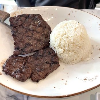 Aji Ceviche Bar - Skirt steak with rice - Seafood Near Me - St. Petersburg, Florida Aji Ceviche Bar - Skirt steak with rice - Seafood Near Me - St. Petersburg, Florida