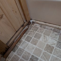 Moulding rot in the bathroom.