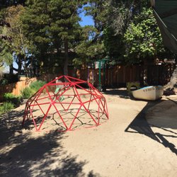 Children's Community Center - Front yard hillside swings.