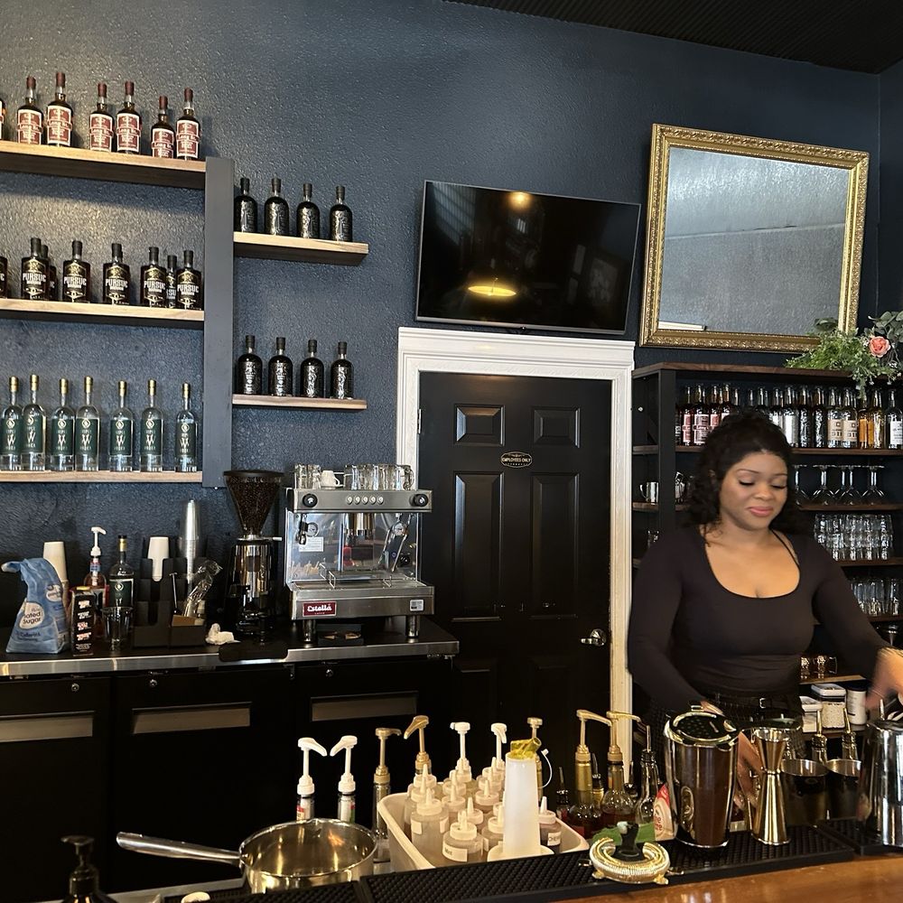 Mossback Distilling - a woman behind the bar - Distilleries Near Me - Jefferson City, Tennessee Mossback Distilling - a woman behind the bar - Distilleries Near Me - Jefferson City, Tennessee