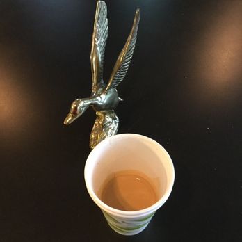 Poindexter Coffee - a cup of coffee on a table - Coffee & Tea Near Me - Charlottesville, Virginia Poindexter Coffee - a cup of coffee on a table - Coffee & Tea Near Me - Charlottesville, Virginia