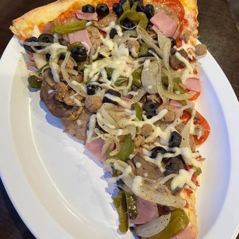 Genna Pizza - World's Largest Slice - Genna - Pizza Near Me - Melbourne, Florida Genna Pizza - World's Largest Slice - Genna - Pizza Near Me - Melbourne, Florida