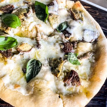Plate - Mushroom pizza - Cocktail Bars Near Me - Kansas City, Missouri Plate - Mushroom pizza - Cocktail Bars Near Me - Kansas City, Missouri