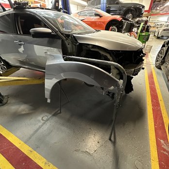iKar Collision - Reinstalling side panel to put on front bumper - Body Shops Near Me - San Fernando Valley, California iKar Collision - Reinstalling side panel to put on front bumper - Body Shops Near Me - San Fernando Valley, California