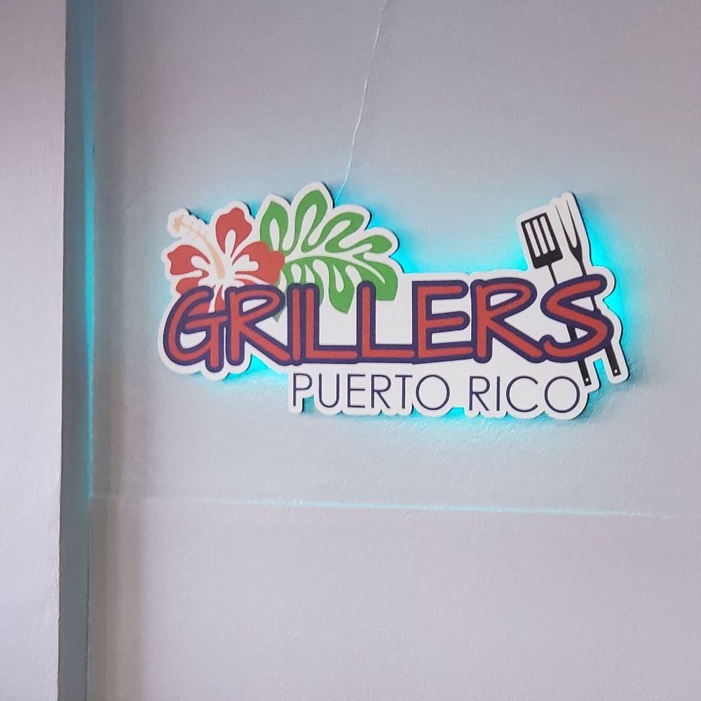 Grillers Puerto Rico - a neon sign for a restaurant - Puerto Rican Near Me - Orlando, Florida Grillers Puerto Rico - a neon sign for a restaurant - Puerto Rican Near Me - Orlando, Florida