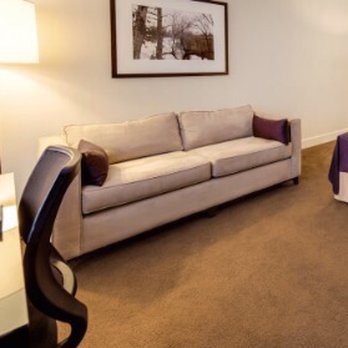 The Andrew Hotel - Couch next to the bed - no privacy - Hotels Near Me - Great Neck, New York The Andrew Hotel - Couch next to the bed - no privacy - Hotels Near Me - Great Neck, New York