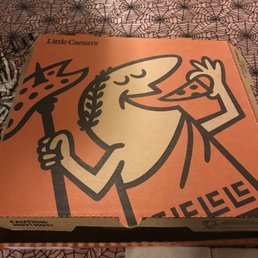 a pizza box on a table