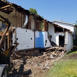 Hauling Guys & Demolitions - Haul Guys use our own Demolitions Equipment and Dump Trucks close quarters to one single home and too the left a 2 story hime