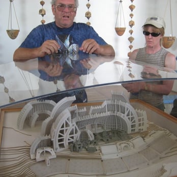 Arcosanti - tourguide Ron standing over the current model of the Arcosanti masterplan (for 5000 inhabitants) - Tours Near Me - Mayer, Arizona Arcosanti - tourguide Ron standing over the current model of the Arcosanti masterplan (for 5000 inhabitants) - Tours Near Me - Mayer, Arizona
