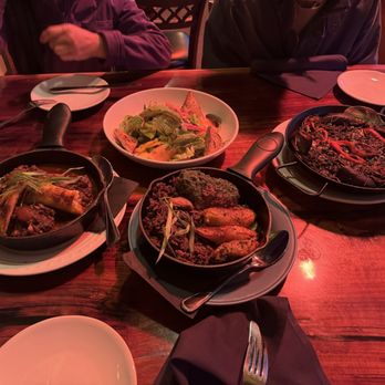 Oyo - Tropical Salad, Oxtail Stew, jerk pork shoulder, paella del Negra. - Latin American Near Me - Pleasanton, California Oyo - Tropical Salad, Oxtail Stew, jerk pork shoulder, paella del Negra. - Latin American Near Me - Pleasanton, California