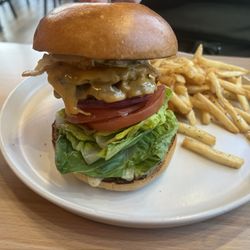 Denizen's Bistro - Double Smashburger topped with a fried egg.