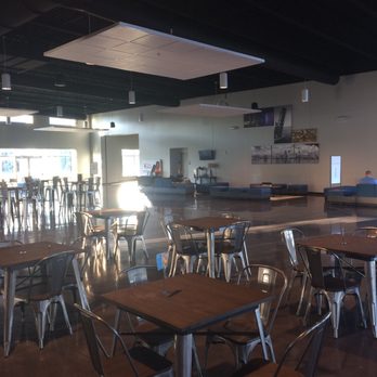 Trinity Cafe - tables and chairs in a restaurant - Coffee & Tea Near Me - Jacksonville, Florida