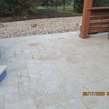 Denali Pools - Ponding in another area due to uneven slope.  Was never given the option to remove all of the pavers.  Denali should have know better. - Pool & Hot Tub Service Near Me - Cedar Park, Texas