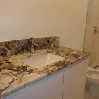 MG Marble & Granite Designers - Exotic granite. They fabricated a taller backsplash which we needed. Granite crystals are translucent. - Countertop Installation Near Me - Delray Beach, Florida MG Marble & Granite Designers - Exotic granite. They fabricated a taller backsplash which we needed. Granite crystals are translucent. - Countertop Installation Near Me - Delray Beach, Florida