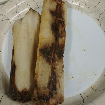 Flushing Homemade Tamales - a peeled banana on a paper plate - Mexican Near Me - Flushing, New York