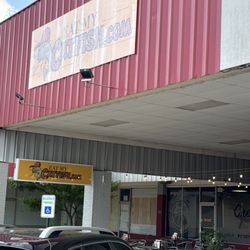 Tucked away in the corner of the strip mall next to Aaron's