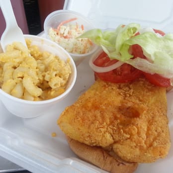 Chow - enough fish for 2 sandwiches - under those fresh veggies, it extends all the way to the back of this box. - Food Trucks Near Me - Cincinnati, Ohio Chow - enough fish for 2 sandwiches - under those fresh veggies, it extends all the way to the back of this box. - Food Trucks Near Me - Cincinnati, Ohio