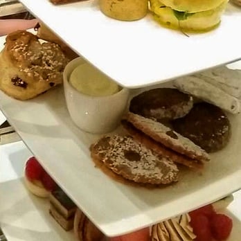 The Pierre - The tea platter, sandwiches on top, scones and butter in middle, desserts on bottom layer - Hotels Near Me - New York, New York The Pierre - The tea platter, sandwiches on top, scones and butter in middle, desserts on bottom layer - Hotels Near Me - New York, New York