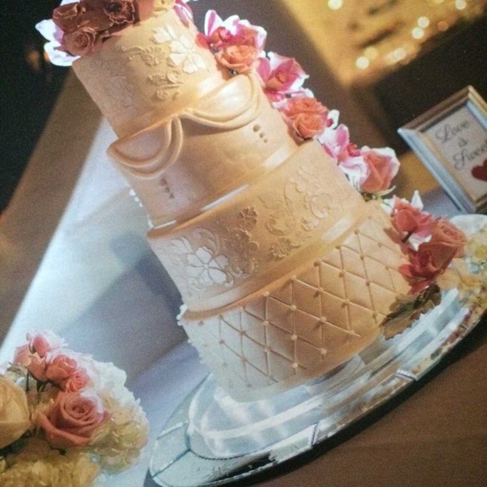 my wedding cake featured on the front cover of my venue's magazine! best $400 i have ever spent. my wedding cake featured on the front cover of my venue's magazine! best $400 i have ever spent.